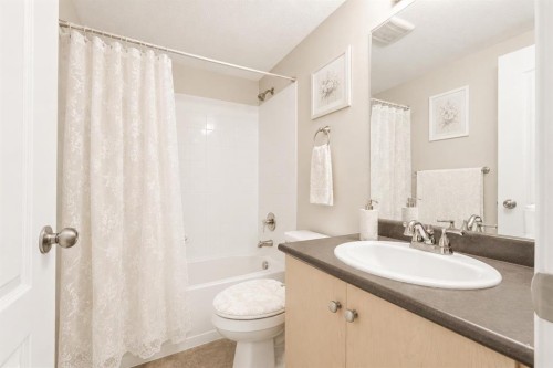 1128-2395 Eversyde Avenue Sw, Calgary, AB - Indoor Photo Showing Bathroom