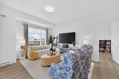 3208-20295 Seton Way Se, Calgary, AB - Indoor Photo Showing Living Room