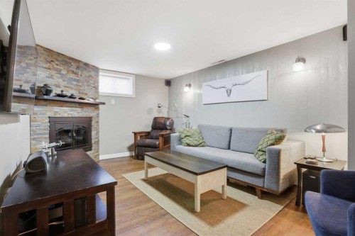 8343 48 Avenue Nw, Calgary, AB - Indoor Photo Showing Living Room With Fireplace