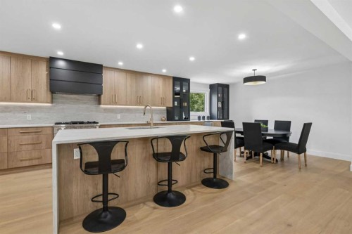 111 Canata Close Sw, Calgary, AB - Indoor Photo Showing Kitchen With Upgraded Kitchen