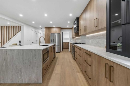 111 Canata Close Sw, Calgary, AB - Indoor Photo Showing Kitchen With Upgraded Kitchen