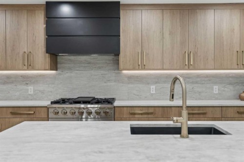 111 Canata Close Sw, Calgary, AB - Indoor Photo Showing Kitchen With Upgraded Kitchen