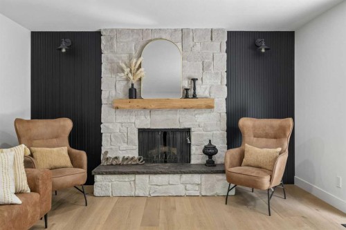 111 Canata Close Sw, Calgary, AB - Indoor Photo Showing Living Room With Fireplace