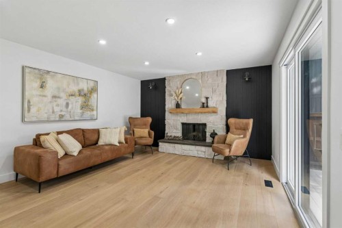 111 Canata Close Sw, Calgary, AB - Indoor Photo Showing Living Room With Fireplace
