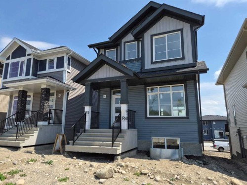 450 River Avenue, Cochrane, AB - Outdoor With Facade