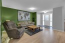367 Fireside Place, Cochrane, AB  - Indoor Photo Showing Living Room 