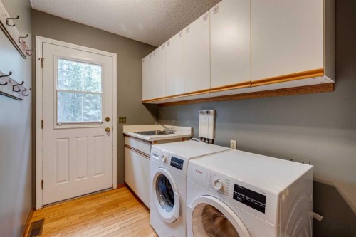 41 Elk Valley Crescent, Bragg Creek, AB - Indoor Photo Showing Laundry Room