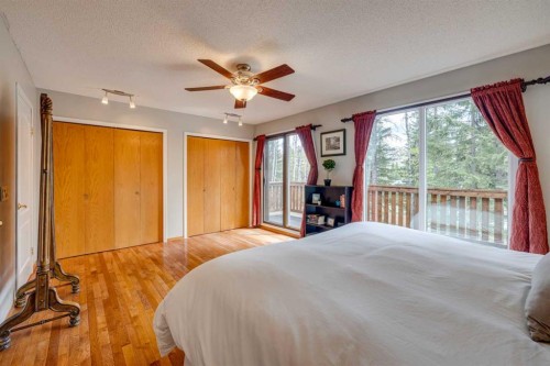 41 Elk Valley Crescent, Bragg Creek, AB - Indoor Photo Showing Bedroom