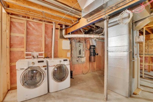 92 Prestwick Heath Se, Calgary, AB - Indoor Photo Showing Laundry Room