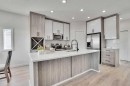 92 Prestwick Heath Se, Calgary, AB  - Indoor Photo Showing Kitchen With Upgraded Kitchen 