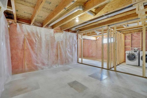 92 Prestwick Heath Se, Calgary, AB - Indoor Photo Showing Basement