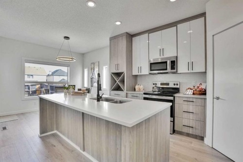 92 Prestwick Heath Se, Calgary, AB - Indoor Photo Showing Kitchen With Double Sink With Upgraded Kitchen