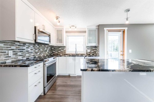 145 Hawkdale Circle Nw, Calgary, AB - Indoor Photo Showing Kitchen With Upgraded Kitchen