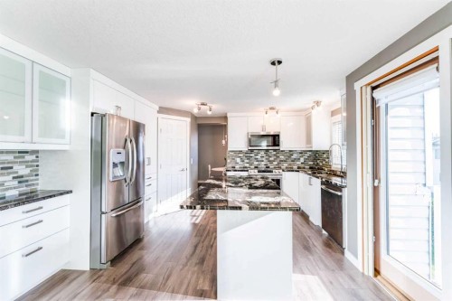 145 Hawkdale Circle Nw, Calgary, AB - Indoor Photo Showing Kitchen With Stainless Steel Kitchen With Upgraded Kitchen