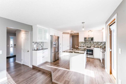 145 Hawkdale Circle Nw, Calgary, AB - Indoor Photo Showing Kitchen With Stainless Steel Kitchen With Upgraded Kitchen