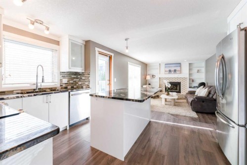 145 Hawkdale Circle Nw, Calgary, AB - Indoor Photo Showing Kitchen With Stainless Steel Kitchen With Double Sink With Upgraded Kitchen