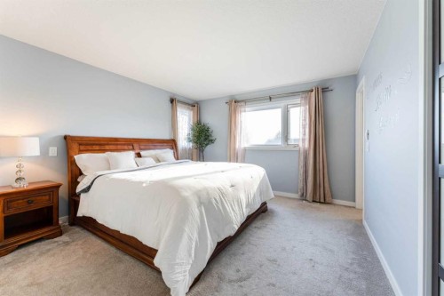 145 Hawkdale Circle Nw, Calgary, AB - Indoor Photo Showing Bedroom