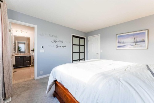 145 Hawkdale Circle Nw, Calgary, AB - Indoor Photo Showing Bedroom