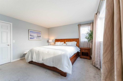 145 Hawkdale Circle Nw, Calgary, AB - Indoor Photo Showing Bedroom