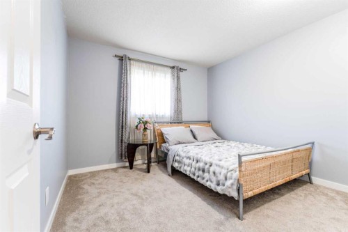 145 Hawkdale Circle Nw, Calgary, AB - Indoor Photo Showing Bedroom