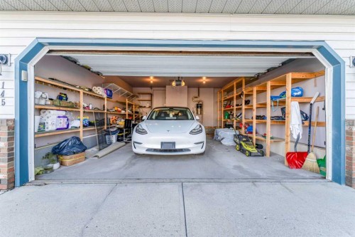 145 Hawkdale Circle Nw, Calgary, AB -  Photo Showing Garage