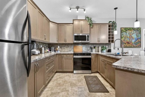 216-35 Aspenmont Heights Sw, Calgary, AB - Indoor Photo Showing Kitchen
