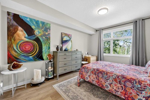 216-35 Aspenmont Heights Sw, Calgary, AB - Indoor Photo Showing Bedroom