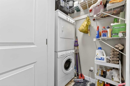 216-35 Aspenmont Heights Sw, Calgary, AB - Indoor Photo Showing Laundry Room