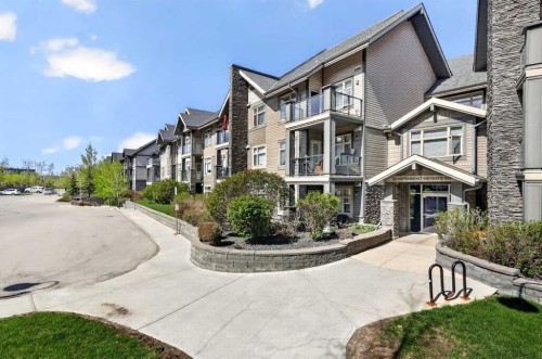 216-35 Aspenmont Heights Sw, Calgary, AB - Outdoor With Balcony With Facade