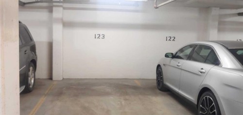 216-35 Aspenmont Heights Sw, Calgary, AB - Indoor Photo Showing Garage