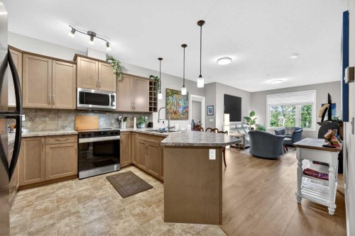 216-35 Aspenmont Heights Sw, Calgary, AB - Indoor Photo Showing Kitchen With Upgraded Kitchen