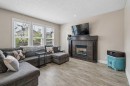 45 Mahogany Terrace Se, Calgary, AB  - Indoor Photo Showing Living Room With Fireplace 