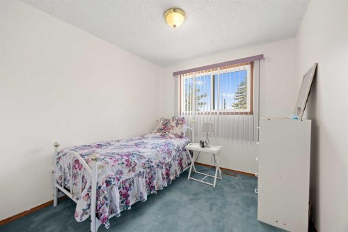 452 Manora Way Ne, Calgary, AB - Indoor Photo Showing Bedroom
