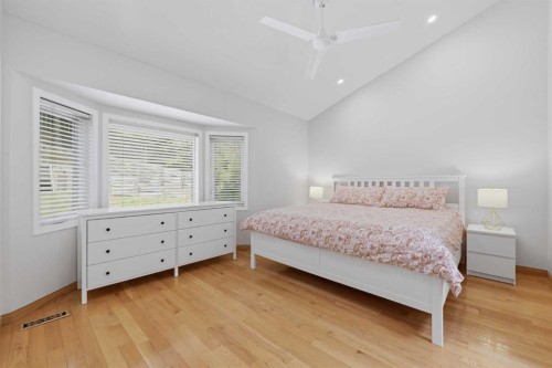 84 Coach Gate Way Sw, Calgary, AB - Indoor Photo Showing Bedroom