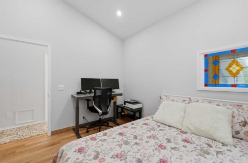 84 Coach Gate Way Sw, Calgary, AB - Indoor Photo Showing Bedroom