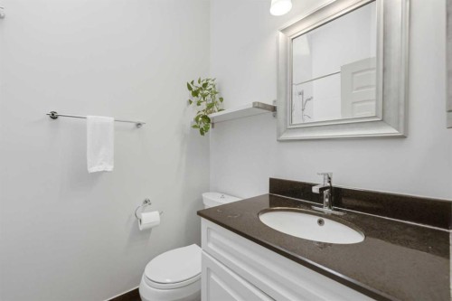 84 Coach Gate Way Sw, Calgary, AB - Indoor Photo Showing Bathroom