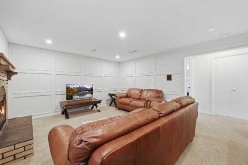 84 Coach Gate Way Sw, Calgary, AB - Indoor Photo Showing Other Room