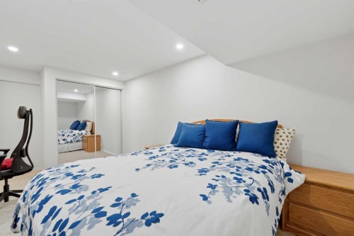 84 Coach Gate Way Sw, Calgary, AB - Indoor Photo Showing Bedroom