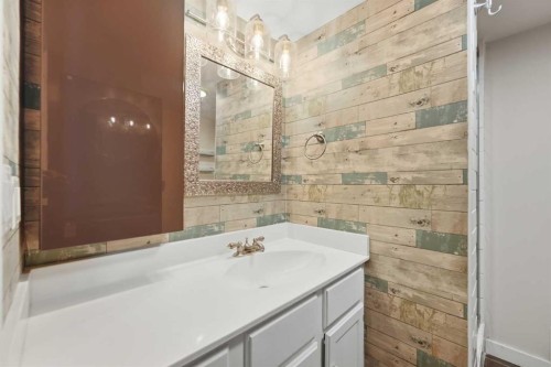 84 Coach Gate Way Sw, Calgary, AB - Indoor Photo Showing Bathroom