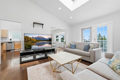 84 Coach Gate Way Sw, Calgary, AB - Indoor Photo Showing Living Room