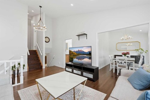 84 Coach Gate Way Sw, Calgary, AB - Indoor Photo Showing Living Room