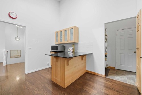 84 Coach Gate Way Sw, Calgary, AB - Indoor Photo Showing Other Room
