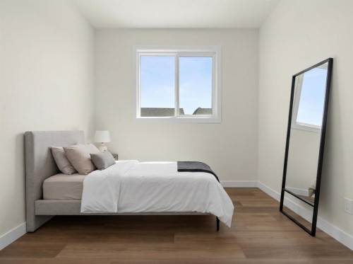 568 Buffaloberry Manor Se, Calgary, AB - Indoor Photo Showing Bedroom