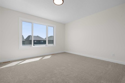 568 Buffaloberry Manor Se, Calgary, AB - Indoor Photo Showing Other Room