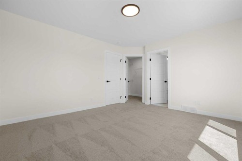 568 Buffaloberry Manor Se, Calgary, AB - Indoor Photo Showing Other Room
