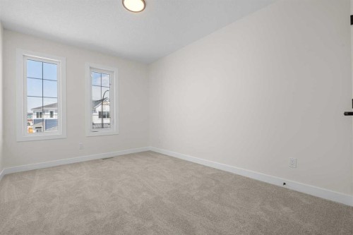 568 Buffaloberry Manor Se, Calgary, AB - Indoor Photo Showing Other Room