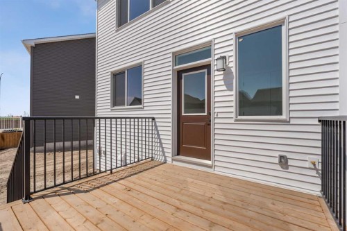 568 Buffaloberry Manor Se, Calgary, AB - Outdoor With Deck Patio Veranda With Exterior