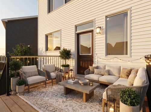 568 Buffaloberry Manor Se, Calgary, AB - Outdoor With Deck Patio Veranda With Exterior