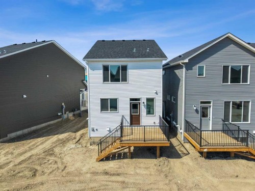 568 Buffaloberry Manor Se, Calgary, AB - Outdoor With Deck Patio Veranda With Exterior