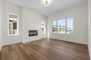 568 Buffaloberry Manor Se, Calgary, AB  - Indoor With Fireplace 